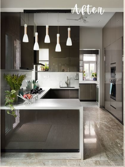 The final 'After' shot of the transformed kitchen. The new layout, modern finishes, and improved lighting create a spacious, elegant, and highly functional kitchen that meets all the client's needs.