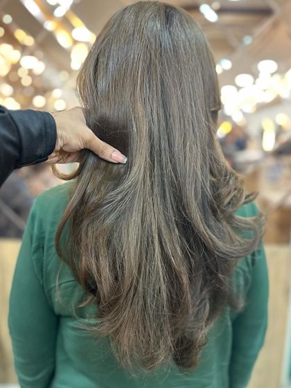 A final look at the beautiful ash brown color, a perfect choice for a subtle but significant change.