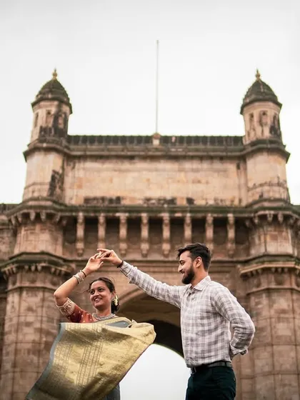 A playful dance in front of the Gateway of India, this pre-wedding photo is full of life and captures the spirit of Mumbai.