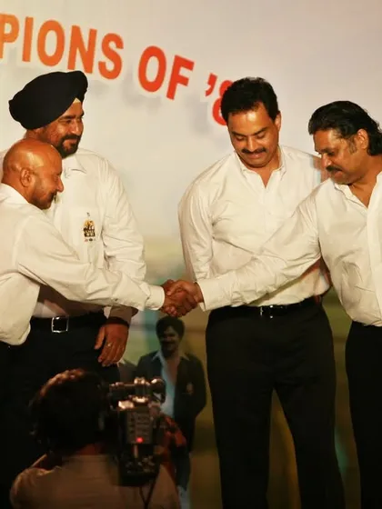 Shaking hands with my teammates Kapil Dev and Syed Kirmani. These are the legends whose stories I share with my students.