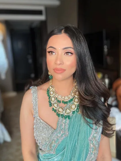 Sanam looking elegant and poised, with makeup that enhances her beautiful features.