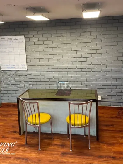 The reception desk at our studio, where our team is always ready to welcome you with a smile.