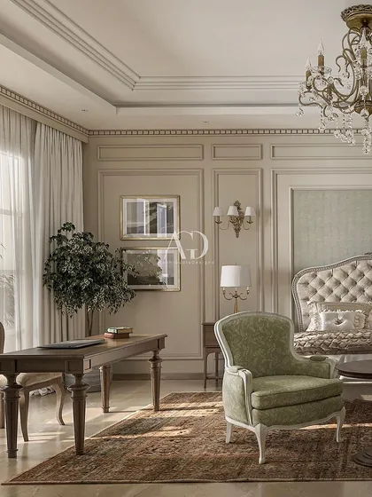 A closer look at the seating and desk area in the Delhi villa bedroom. The design demonstrates how to create distinct functional zones within a single room while maintaining a cohesive and elegant aesthetic.