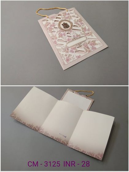 This handled invitation card features delicate laser-cut floral patterns on a soft pink background. The collage shows the exterior and the blank tri-fold insert ready for your message.