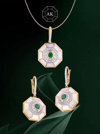 Geometric, glamorous, and gorgeous. This pendant and earring set from our Eternal Collection features a bold octagon design with natural emeralds, diamonds, and mother-of-pearl in 18K gold. It’s minimal, modern, and makes a statement without being loud.