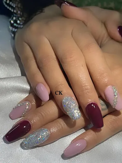 A beautiful and balanced set for a friend, combining solid maroon, soft pink, and a full-coverage silver glitter nail with rhinestone accents.
