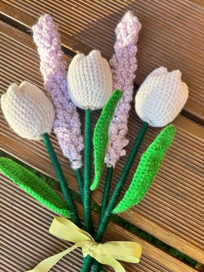 A lovely combination of textures and colors. This small arrangement features our handmade crochet tulips in white, paired with soft lavender stalks for a delicate and pretty look.
