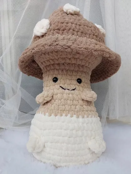 Beyond clothing, I also take on fun challenges like amigurumi. This adorable mushroom plushie, with its soft, velvety texture and sweet expression, makes a perfect desk buddy or a whimsical gift.
