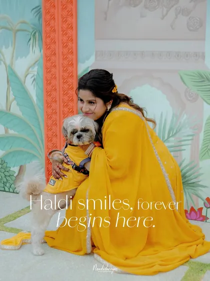 A heartwarming moment between the bride and her furry friend, both dressed for the occasion. This shows the importance of including all family members in the celebration.