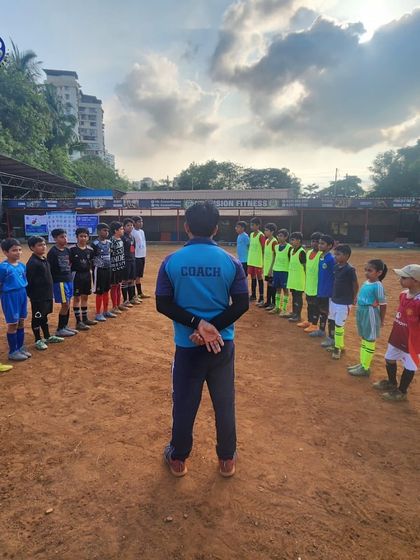 A coach's perspective, addressing two teams lined up before a match. This image captures the respect and order we maintain in our competitions.