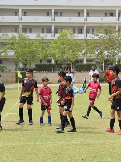 Players getting into position before a set piece. Tactical awareness and positioning are key elements we focus on during our team coaching sessions.