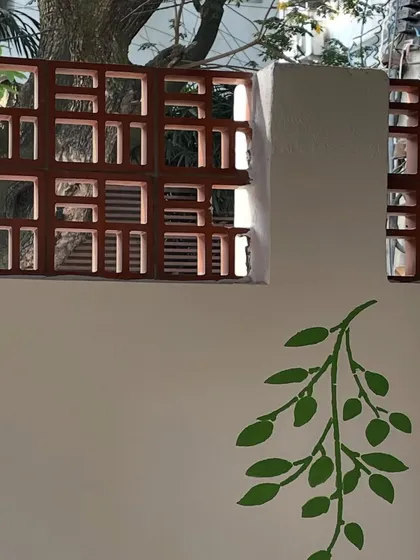 The view from inside the studio, looking out through the decorative jaali brickwork. It is a peaceful and inspiring place to sit and stitch.