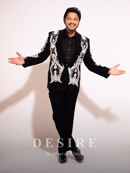 An expression of pure style. This image shows the versatility of my bespoke jacket, perfect for making a grand entrance or celebrating a personal victory. The embroidery is designed to be seen and remembered.