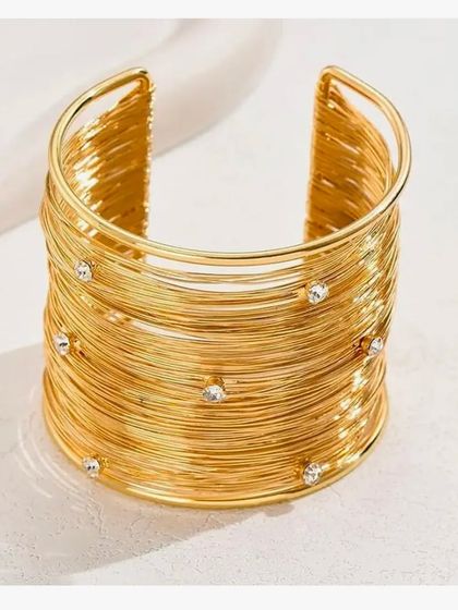 Another view of the statement mesh cuff bangle, showcasing its shine and the embedded crystals.
