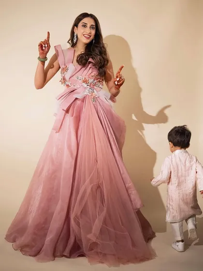A playful moment captured. The makeup is designed to look beautiful from every angle, whether in a posed photo or a candid shot, ensuring you look your best throughout the event.