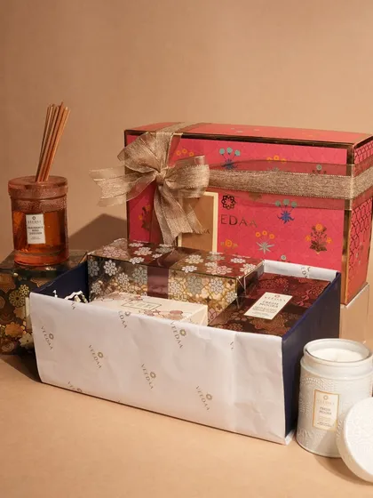 We design every gift set to be a complete sensory journey. This hamper showcases a thoughtful combination of our products, including a reed diffuser, room spray, and hand-poured candles, presented in our signature gift box ready for any occasion.