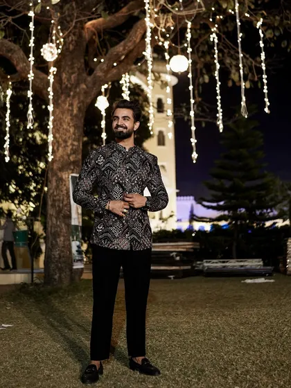 Under the fairy lights, ready to create some magic. The ambiance of an event is everything.