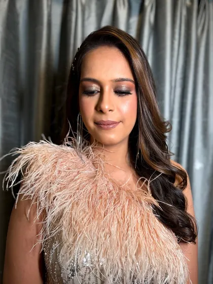 A serene shot with eyes closed, showcasing the beautiful blend of the smokey eyeshadow.