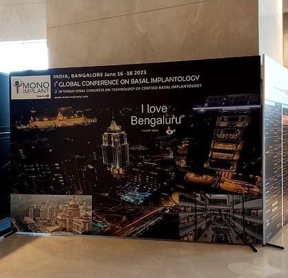 Another view of the large, branded wall at the Global Conference on Basal Implantology. Such large-scale graphics are effective in defining a brand's space and attracting attention from afar.