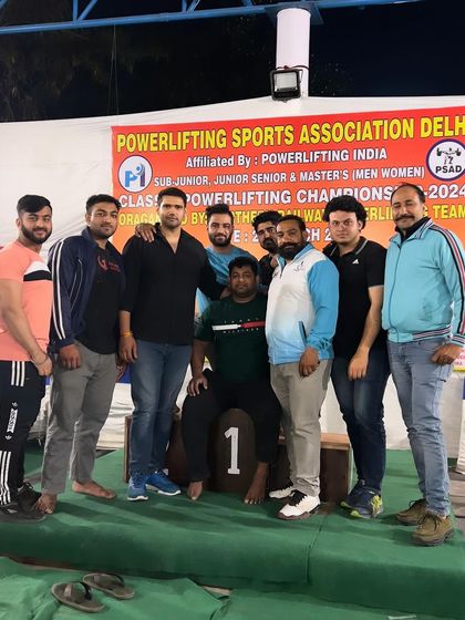 Surrounded by my team on the winner's podium. This is what brotherhood in strength looks like.