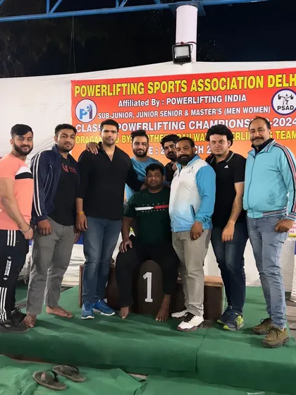 Surrounded by my team on the winner's podium. This is what brotherhood in strength looks like.