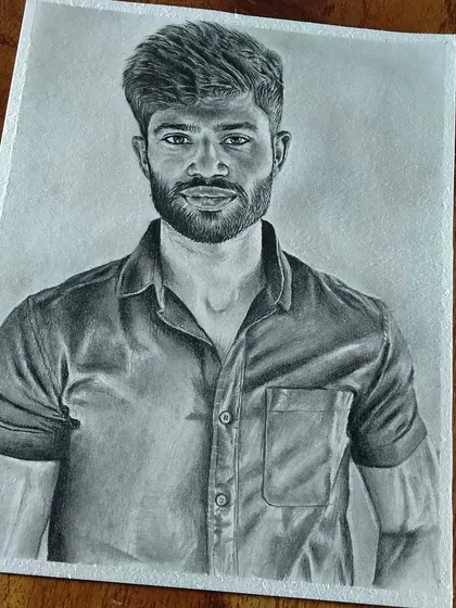 A commissioned portrait of a man with a beard, focusing on a natural and friendly expression.