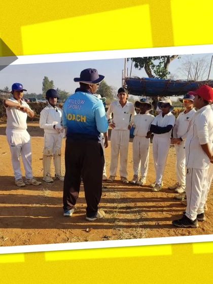 A coach giving a team talk before a match. We prepare our players mentally and tactically for every game.