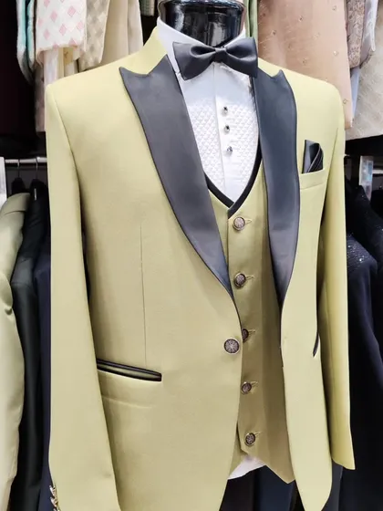 A collection of our designer suits, showcasing a variety of colors, fabrics, and custom details like embroidery, unique lapels, and accessories. Each piece is crafted to make a lasting impression.