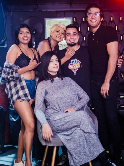 A group of friends posing for a photo.