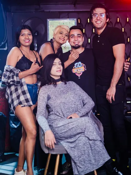 A group of friends posing for a photo.