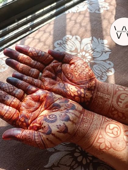 A stunning dark stain on a design featuring peacocks and elephants.