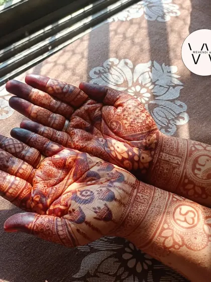 A stunning dark stain on a design featuring peacocks and elephants.