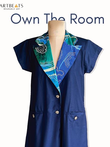 Own the room with the Komorebi Blazer Dress. This image showcases the dress on a mannequin, highlighting its powerful yet elegant structure and unique artistic collar.