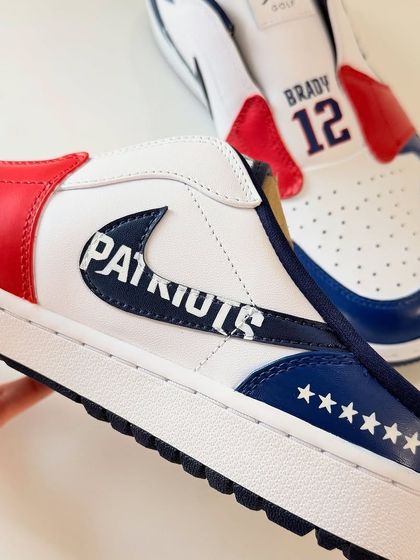 This detail shot shows the custom "Patriots" logo I painted inside the Nike swoosh, along with six stars on the heel to represent the team's six championship wins.