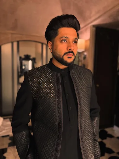 A thoughtful pose. The details on this jacket are just as intricate as the notes in a song.