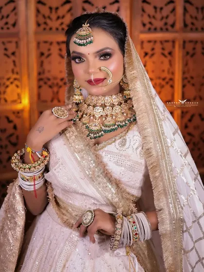 A confident portrait of the bride, her direct gaze and pose exuding modern elegance.