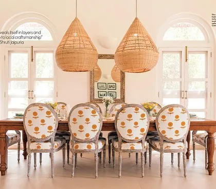 For this Spanish-inspired villa in Goa, the dining room is the heart of the home. I designed these oversized cane light fixtures and had them custom-made by local Goan artisans, bringing a piece of the region's craft heritage right to the dinner table.