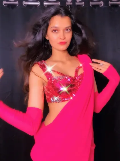 A photoshoot inspired by the iconic saree looks of Bollywood. I draw inspiration from films for both my choreography and my personal style.