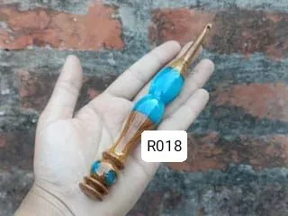 Here is another one of my unique hybrid hooks, this one with a bright turquoise resin handle. The combination of polished wood and colorful resin makes it a joy to use.