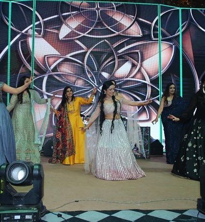 The bride and her bridesmaids in a beautiful, coordinated dance. We love creating routines that highlight the bond between friends.