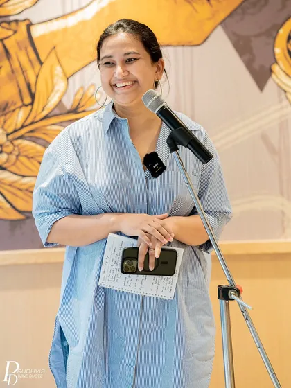 A smiling performer at our Independence Day celebration. The gathering was united by a shared love for poetry and the nation.