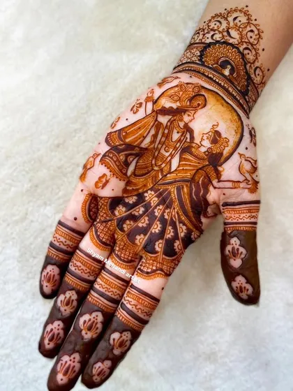 A romantic portrait of Radha and Krishna, perfect for a bride who wants a design that symbolizes love and devotion.