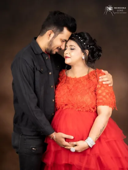 A beautiful, tender moment captured during the maternity shoot. The makeup is designed to look soft and elegant.