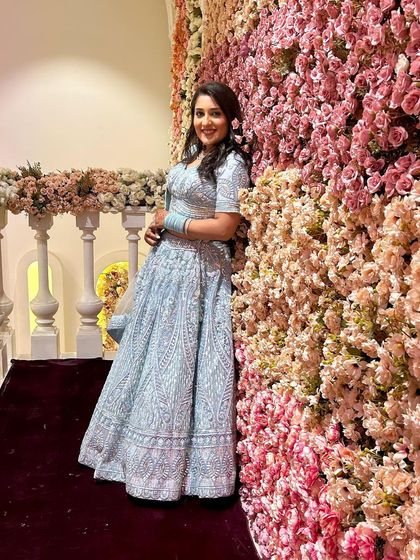 More pictures of my client enjoying her event in the powder blue lehenga. It's so rewarding to see my outfits become a part of someone's happy memories.