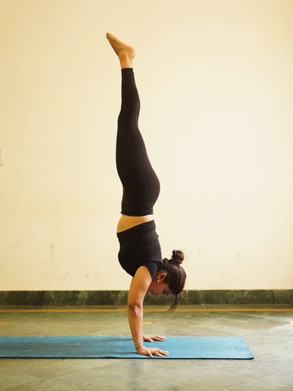 "Yoga is the practice of tolerating the consequences of being yourself." A steady handstand, or Adho Mukha Vrksasana.