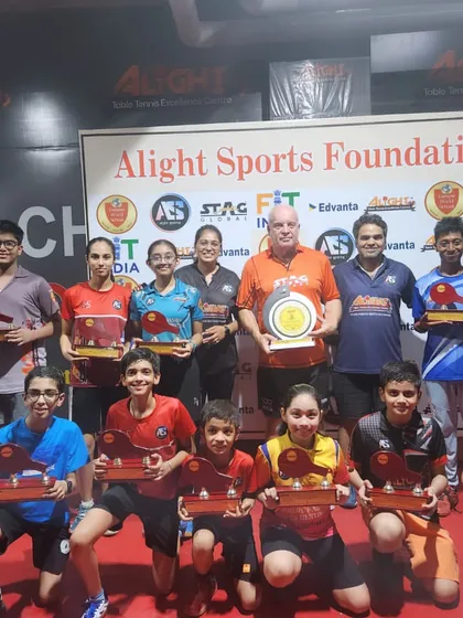 The participants of our High-Performance Camp with Coach Jan Berner, holding mementos from an incredible week of learning and training.