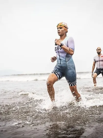 This is the start of your race day journey. Emerging from the open water swim at IRONMAN Goa, focused and ready for the transition. My camps prepare you for every second of this, building your confidence in the water so you can attack the rest of the course.