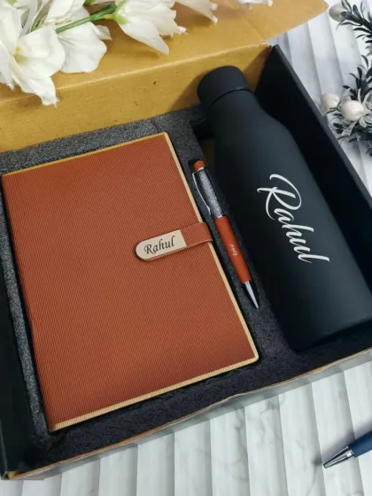 This tan-colored diary and black water bottle set is another great option for corporate gifting, personalized with the employee's or client's name.