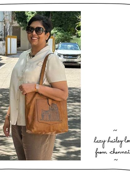 Smitha from Chennai looking radiant with her Lazy Hailey tote, featuring a beautiful Gond art owl on a rich Mustard leather.