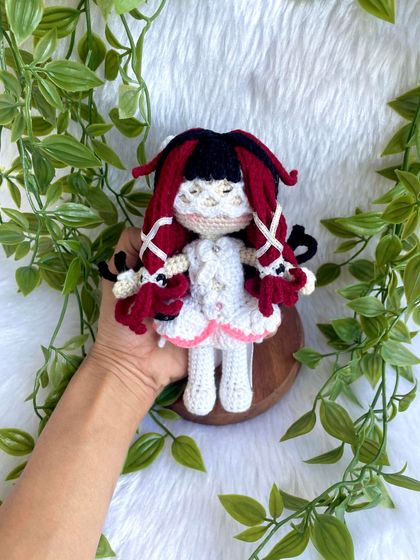 This is Columbina Damselette, a beautifully detailed anime character. The intricate hairstyle with red and black locks and the delicate white dress was a challenge I truly enjoyed creating.